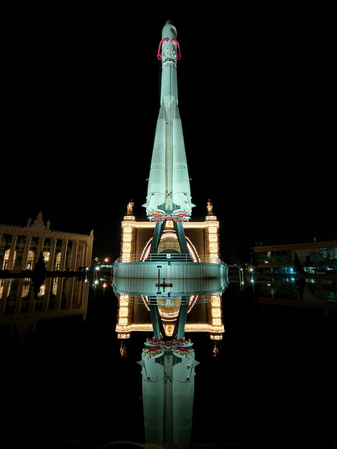 white and blue tower during night time