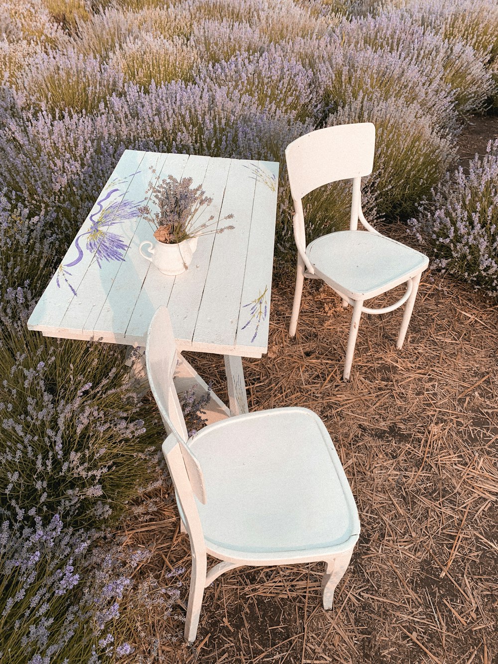 white wooden table with chair