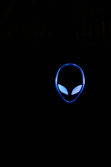 A sleek digital avatar of Max glowing softly with blue and gold accents, set against a minimalist white background.