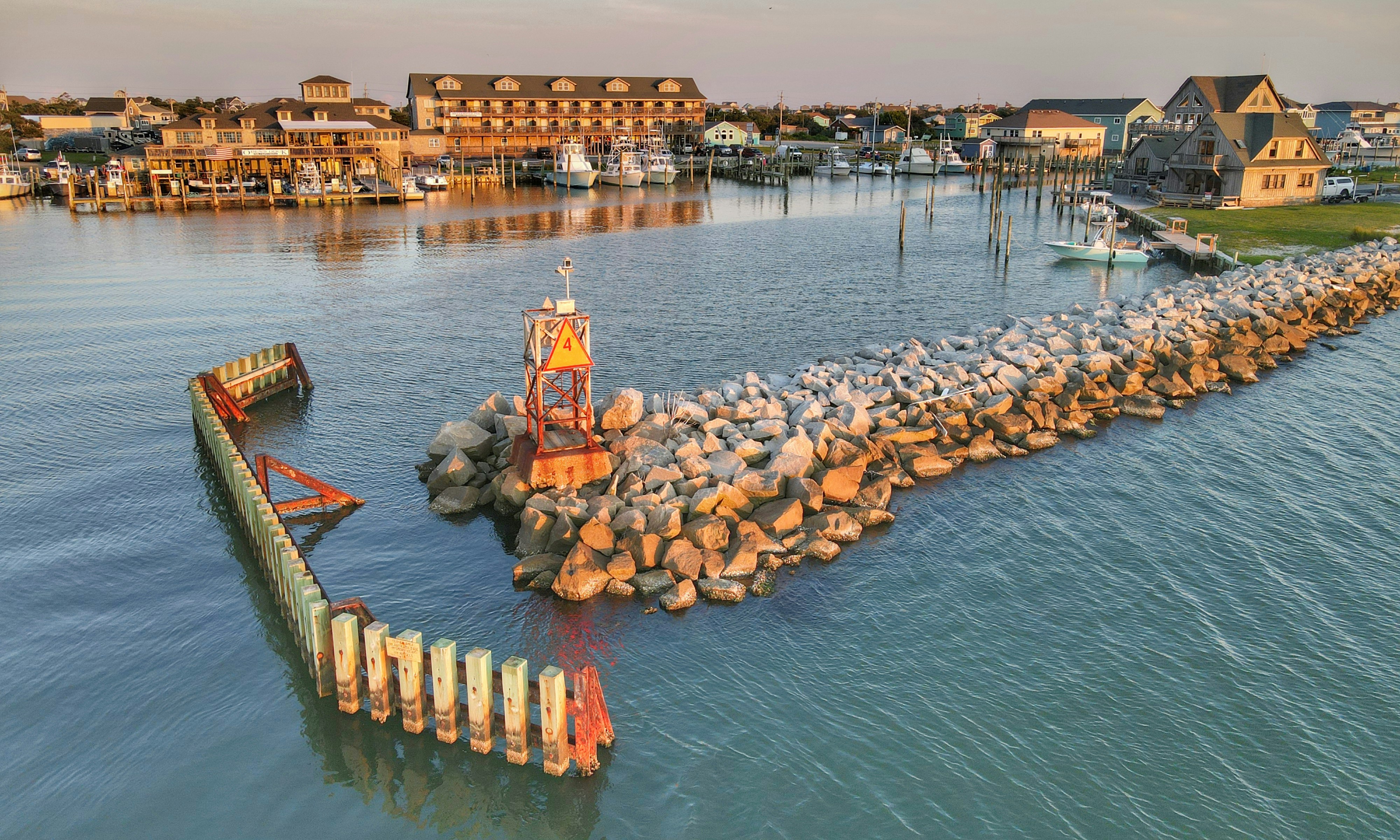 boats on dock during daytime