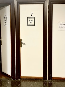 Technician handling radiation source equipment in a secure facility