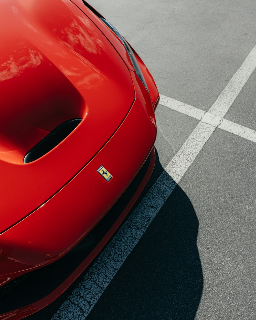 red ferrari car on road