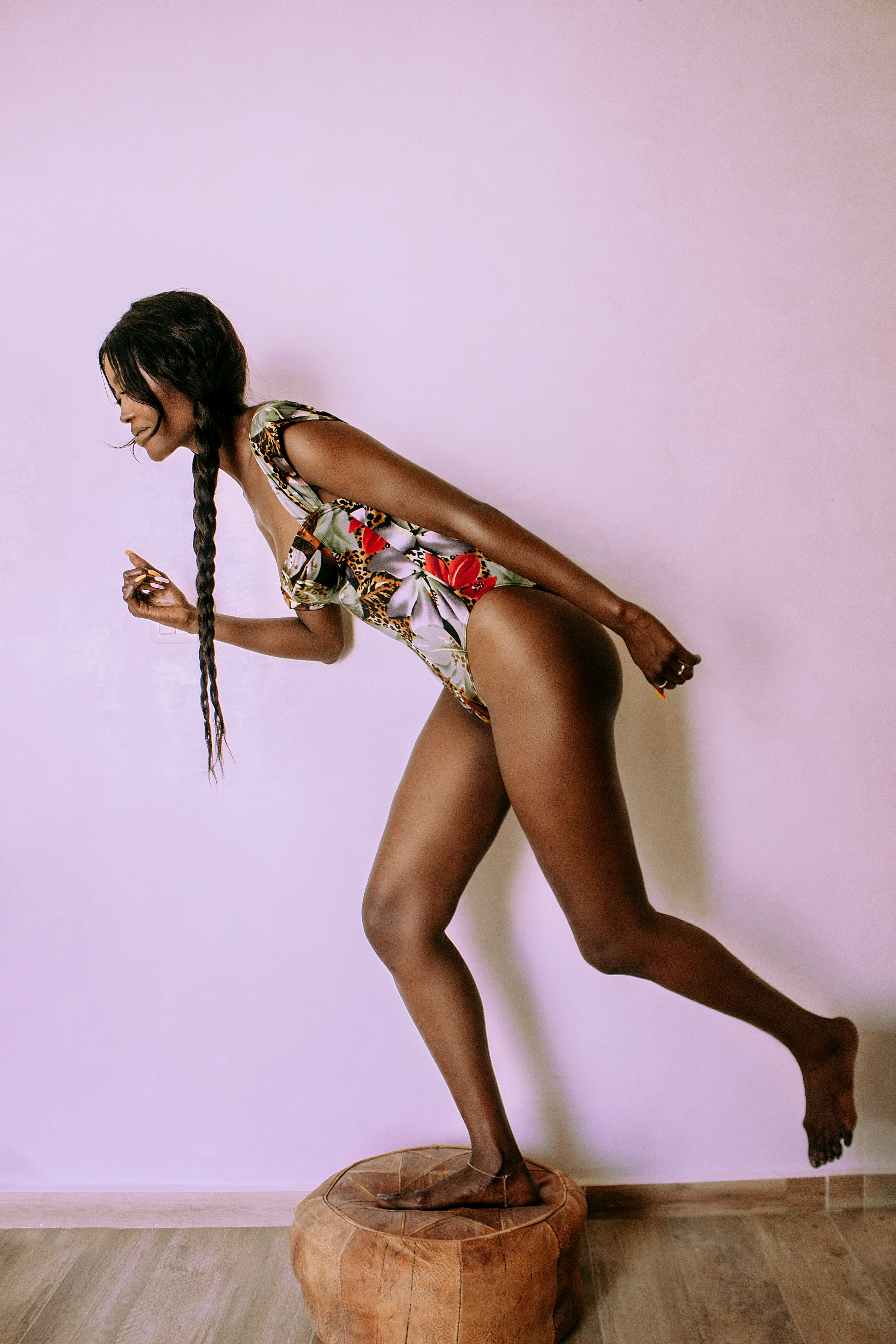 woman in white red and blue floral swimsuit