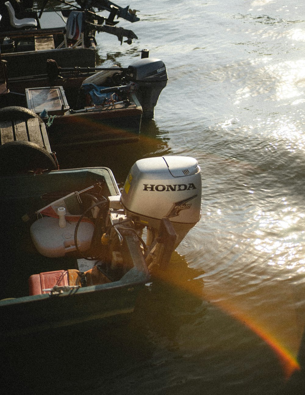 white and black boat on water