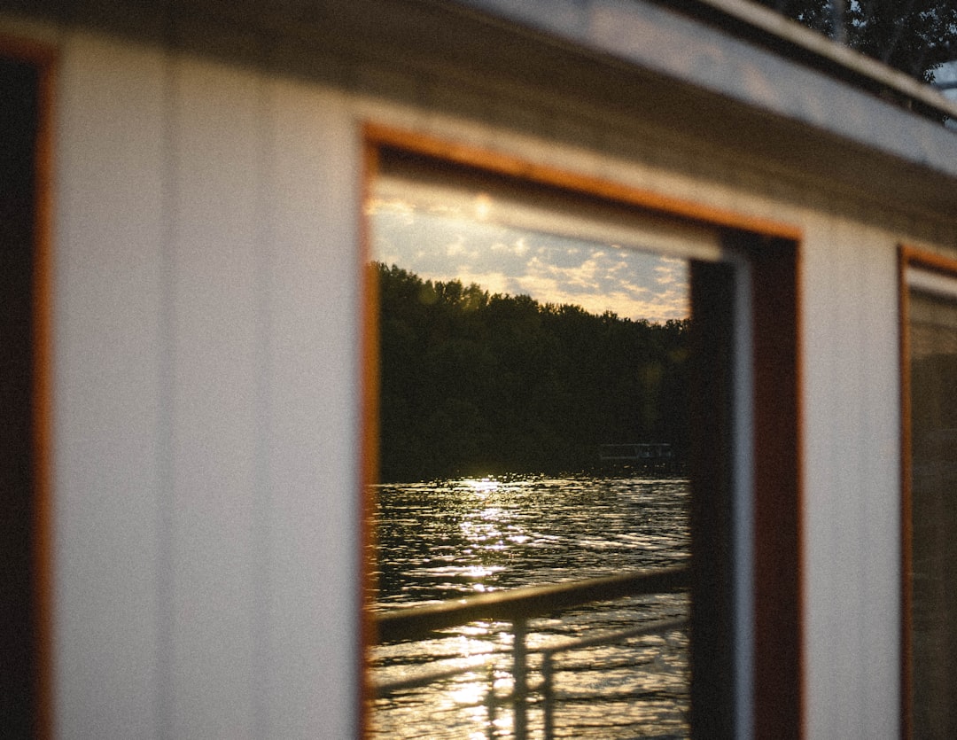 white wooden framed glass window