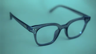 Elegant progressive lenses displayed on a dark premium background with soft lighting.