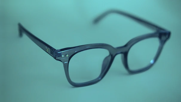 Elegant progressive lenses displayed on a dark premium background with soft lighting.