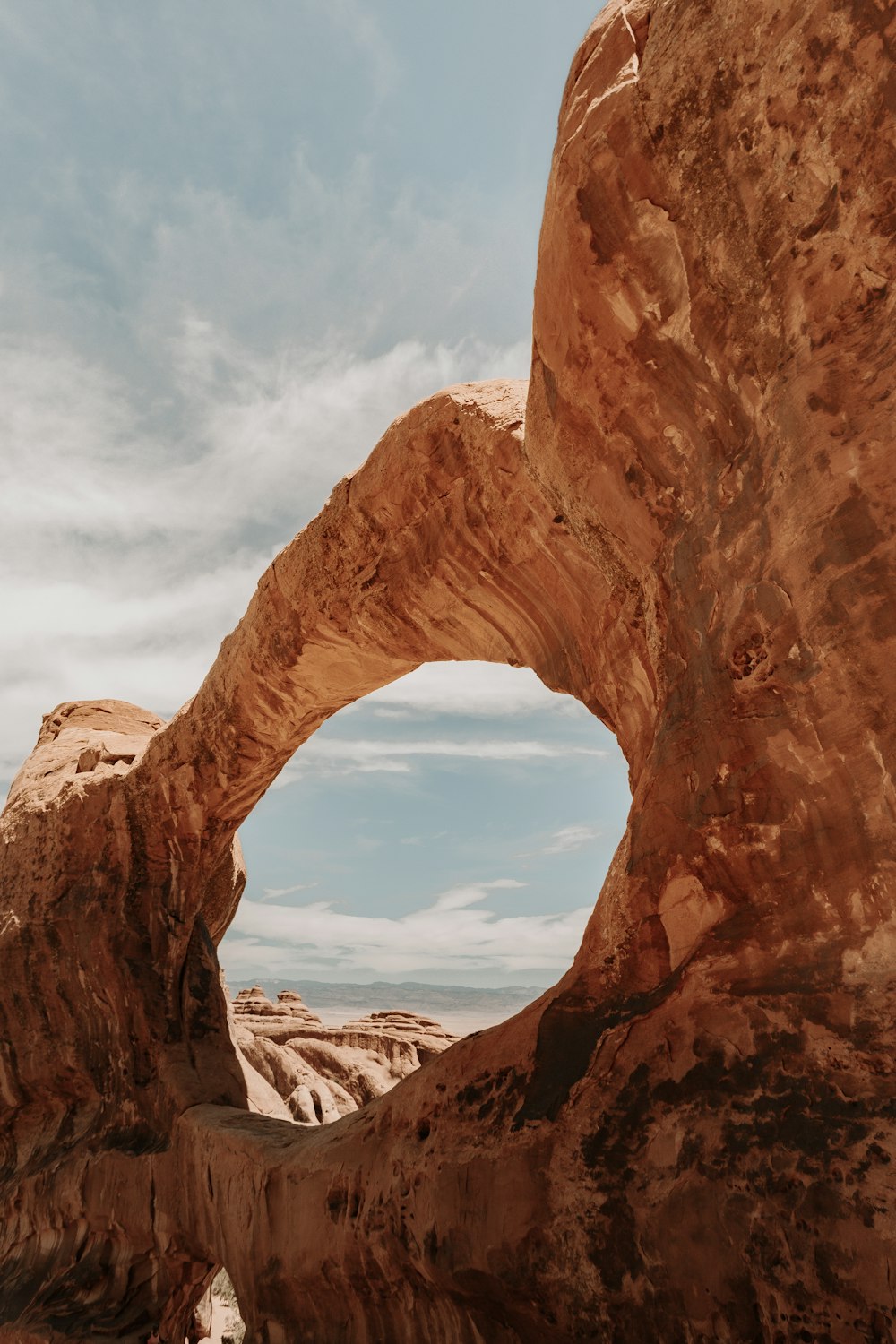 brown rock formation under blue sky during daytime