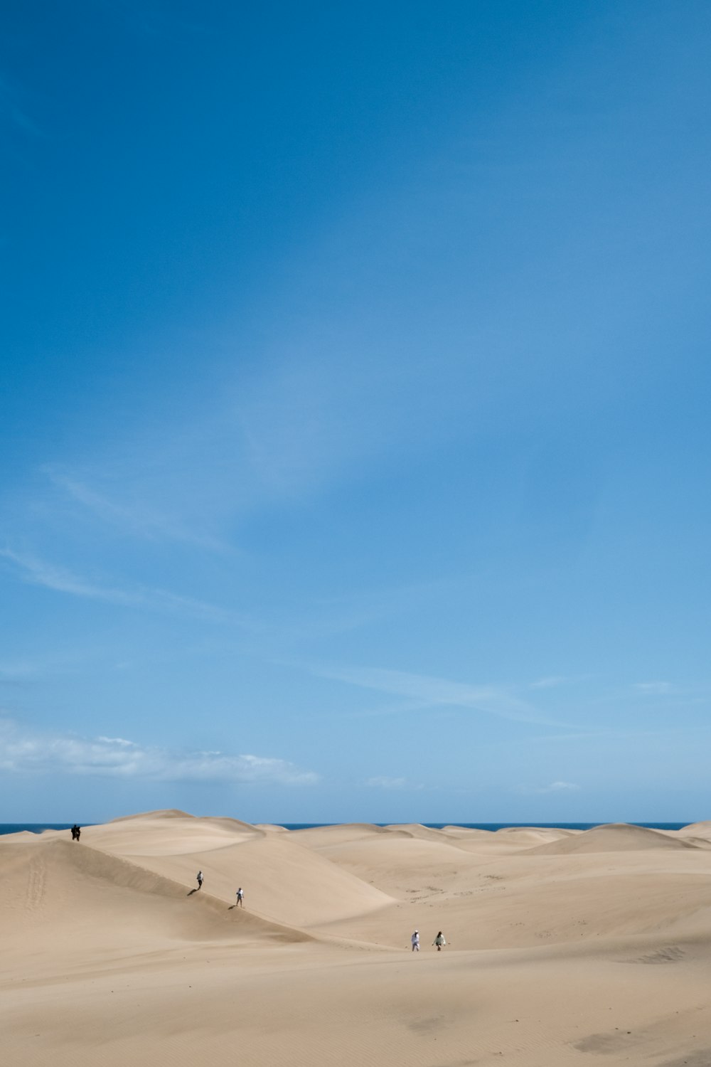 desert under blue sky during daytime