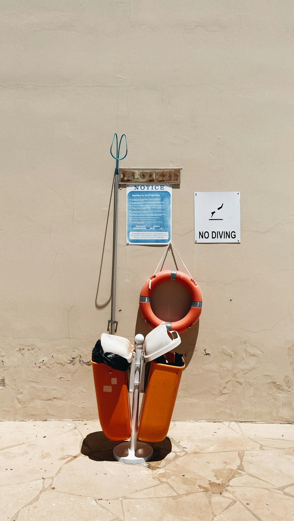 orange and white bucket with water