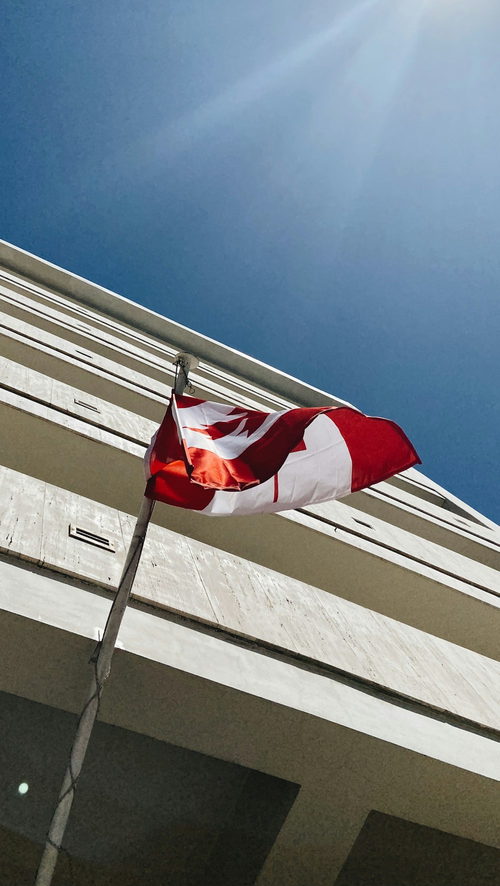 white red and blue flag on pole