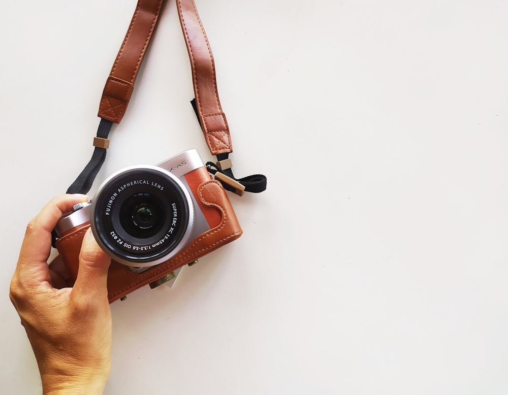 black and silver dslr camera