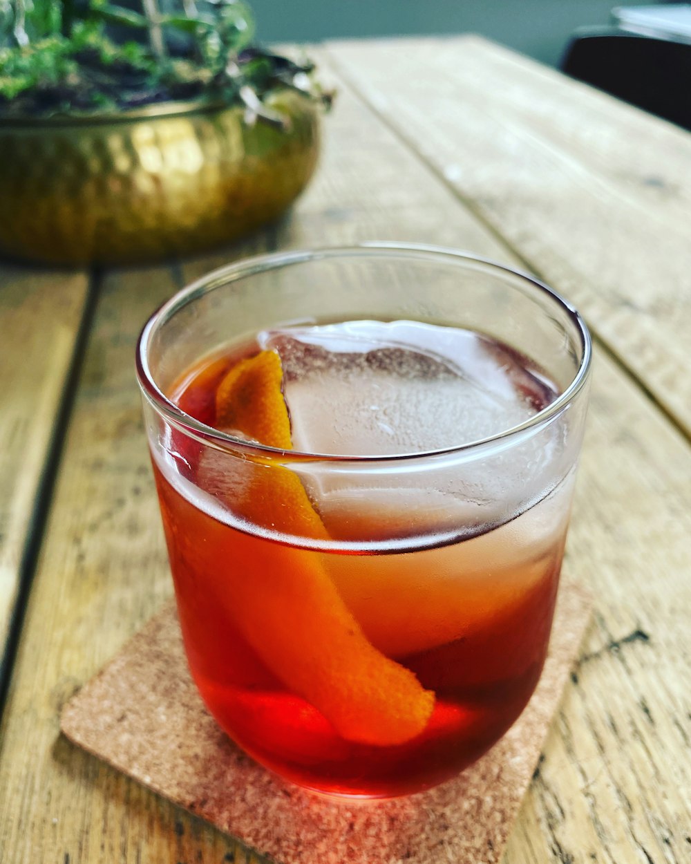 clear drinking glass with orange juice