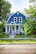 Elegant home exterior featuring a fresh home renovation with navy blue and beige accents in North Carolina.