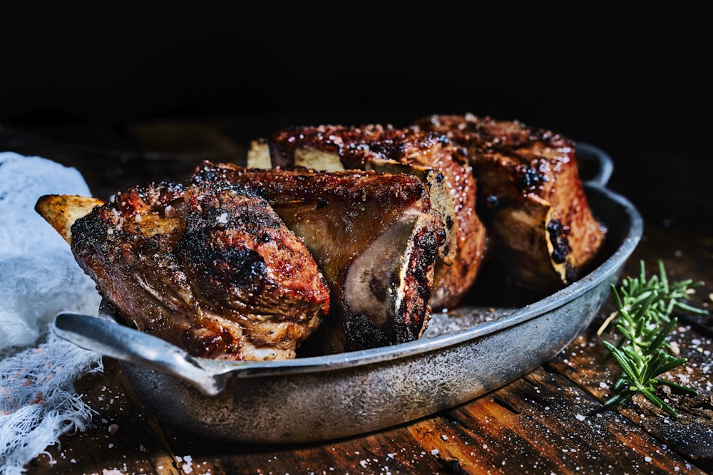 grilled meat on stainless steel tray