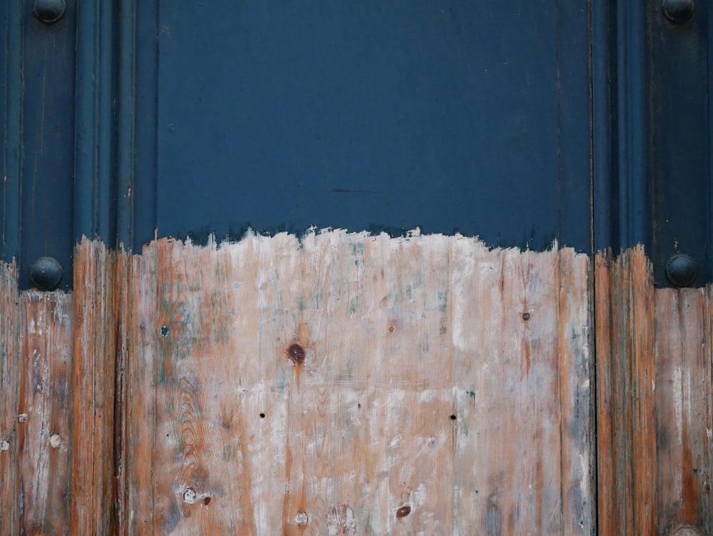 blue wooden door with white wooden door