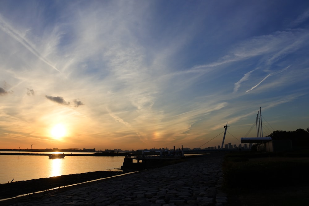 silhouette of bridge during sunset