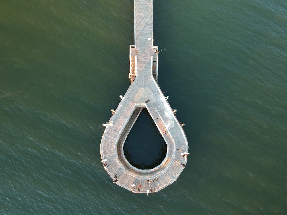 aerial view of gray concrete bridge