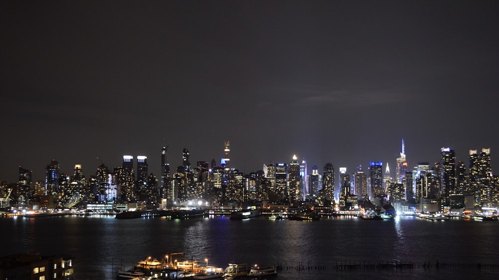 city skyline during night time