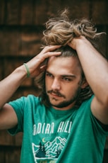 man in green crew neck t-shirt