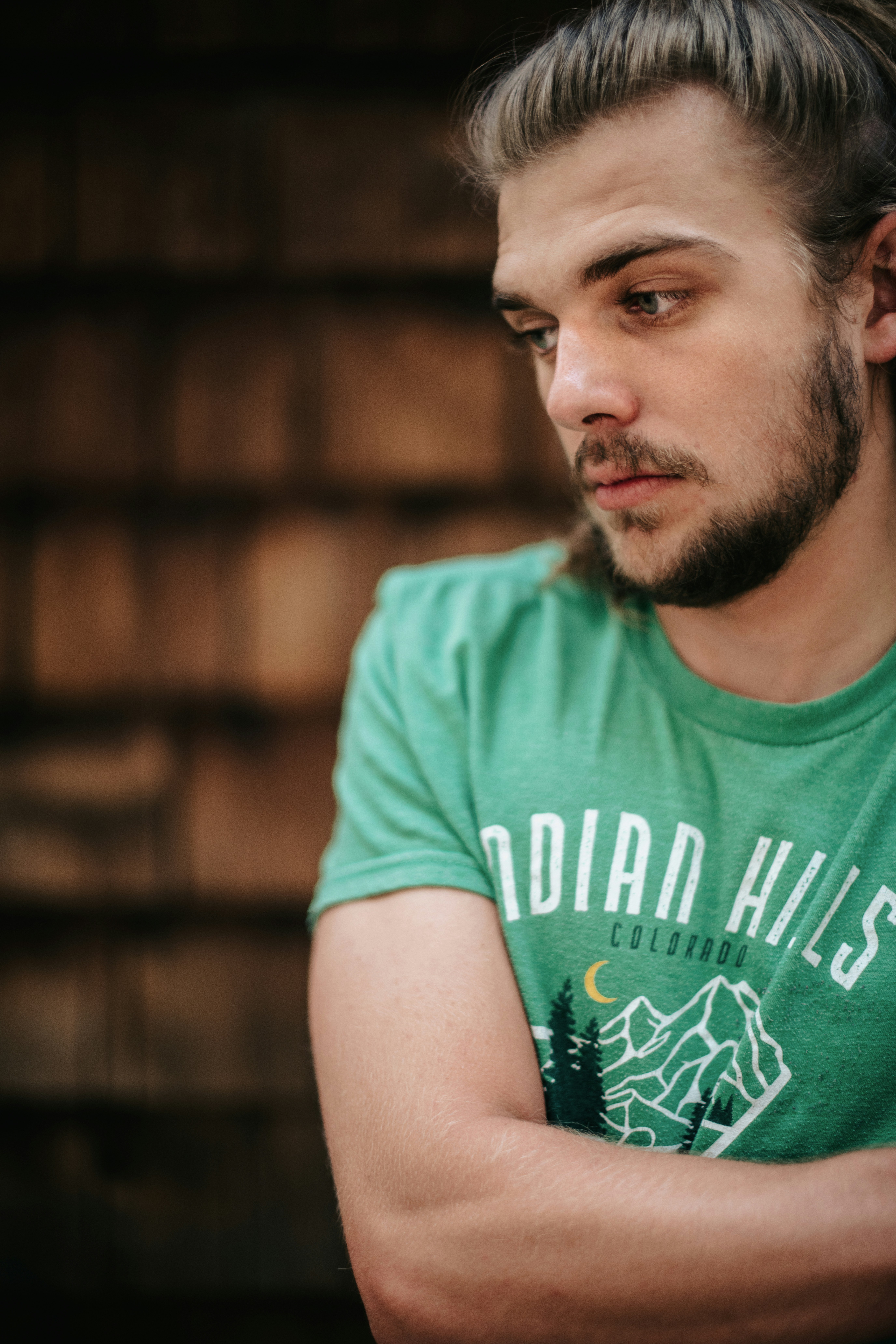 man in green crew neck t-shirt