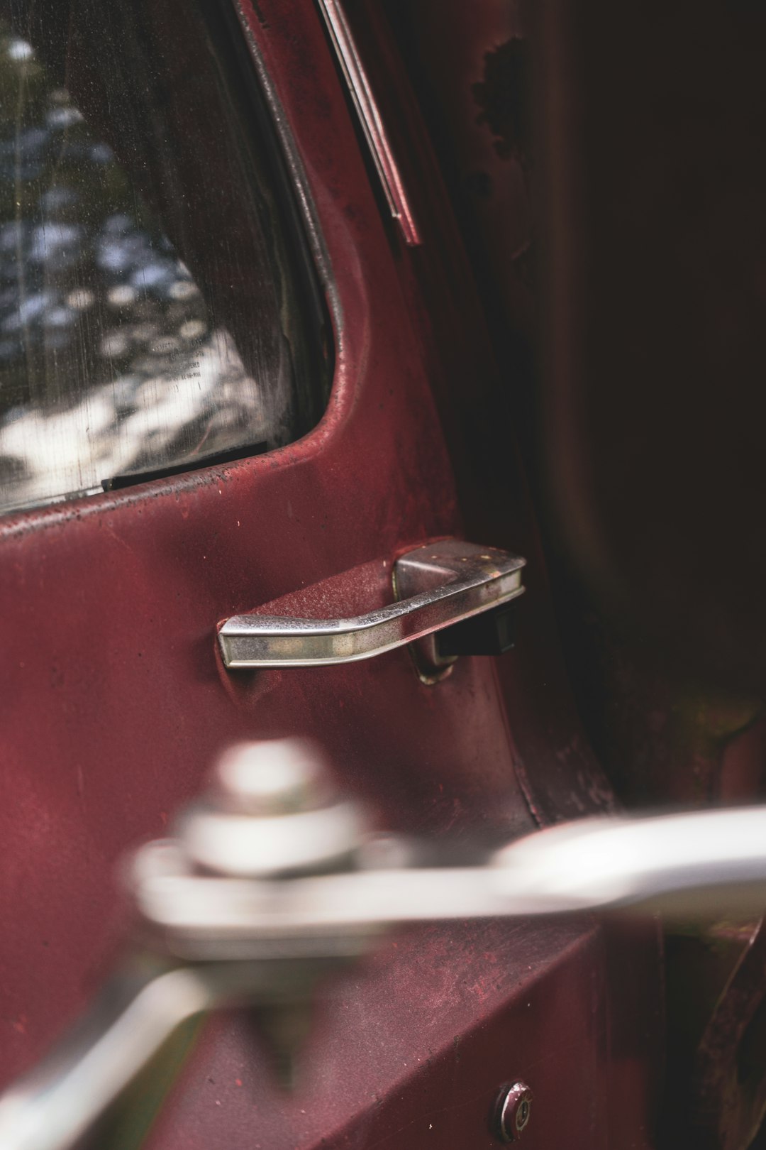 red car with white and black steering wheel