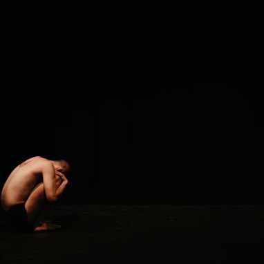 naked woman lying on floor