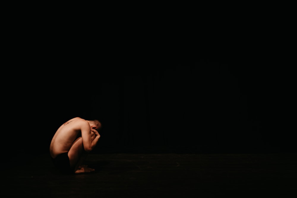 naked woman lying on floor