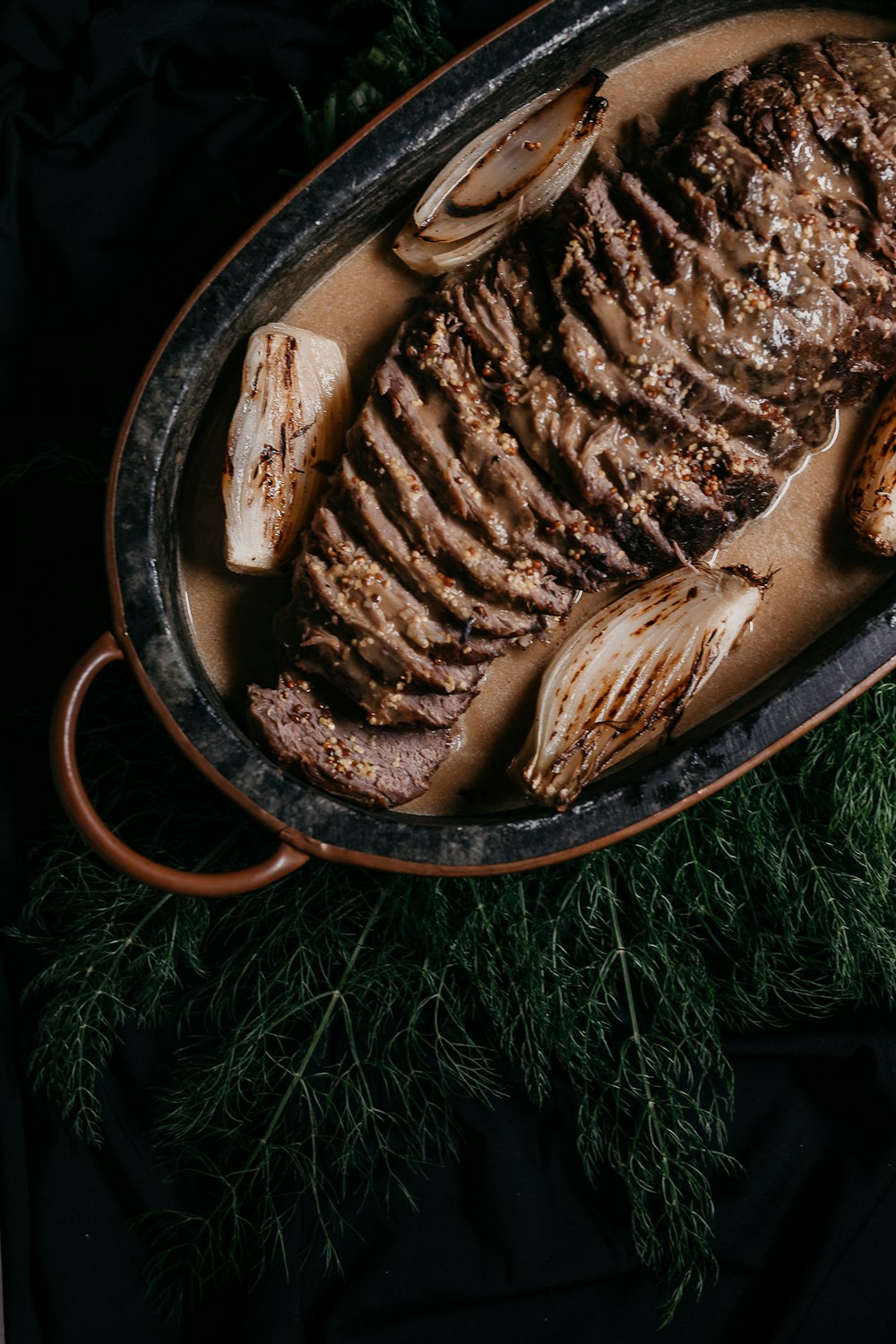 brown and black round plate