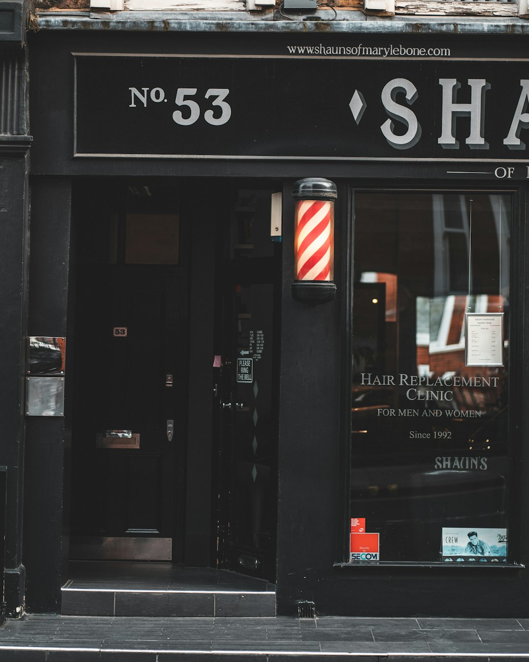 us flag on black wooden door