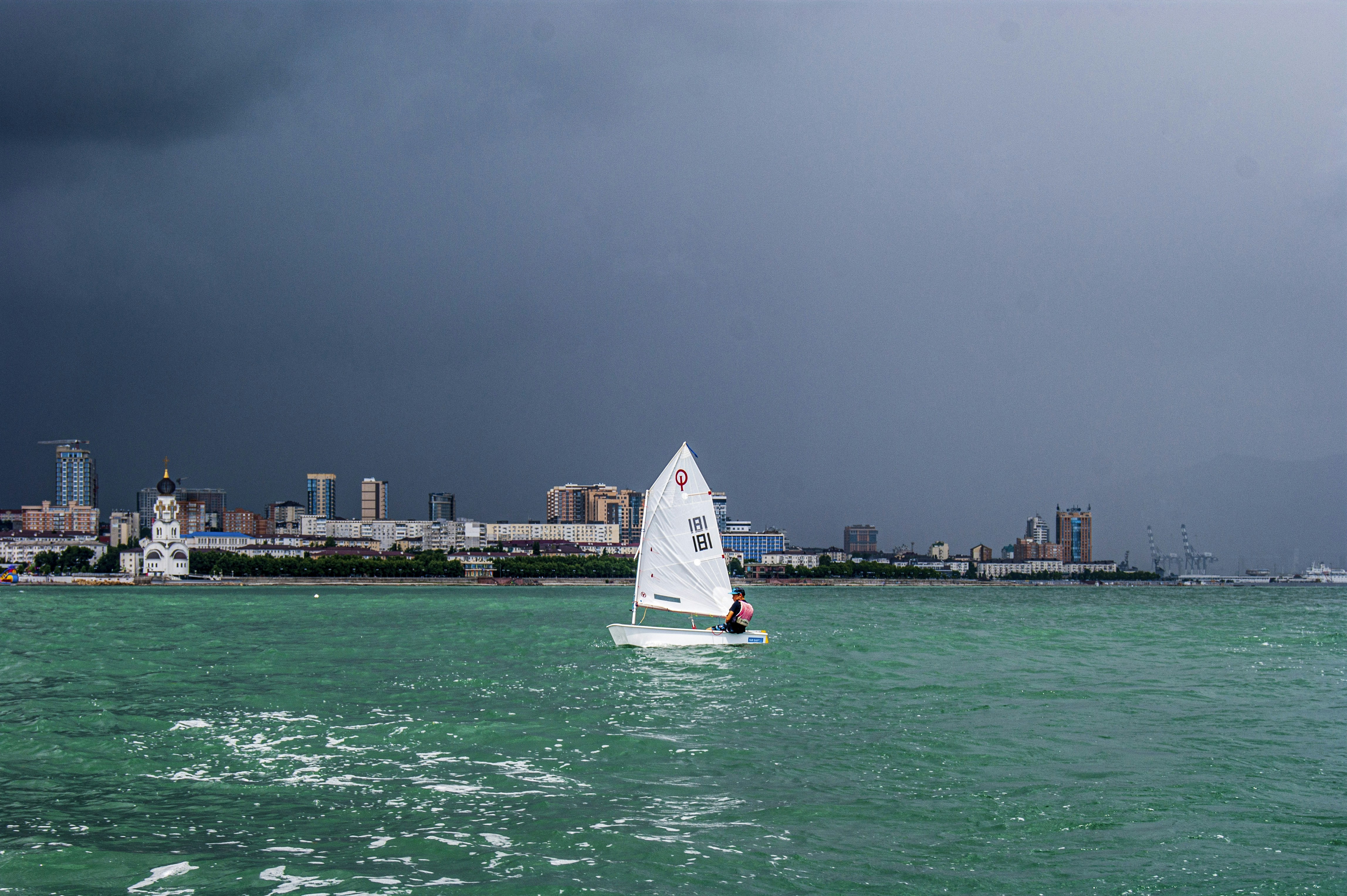 white sailboat on sea during daytime