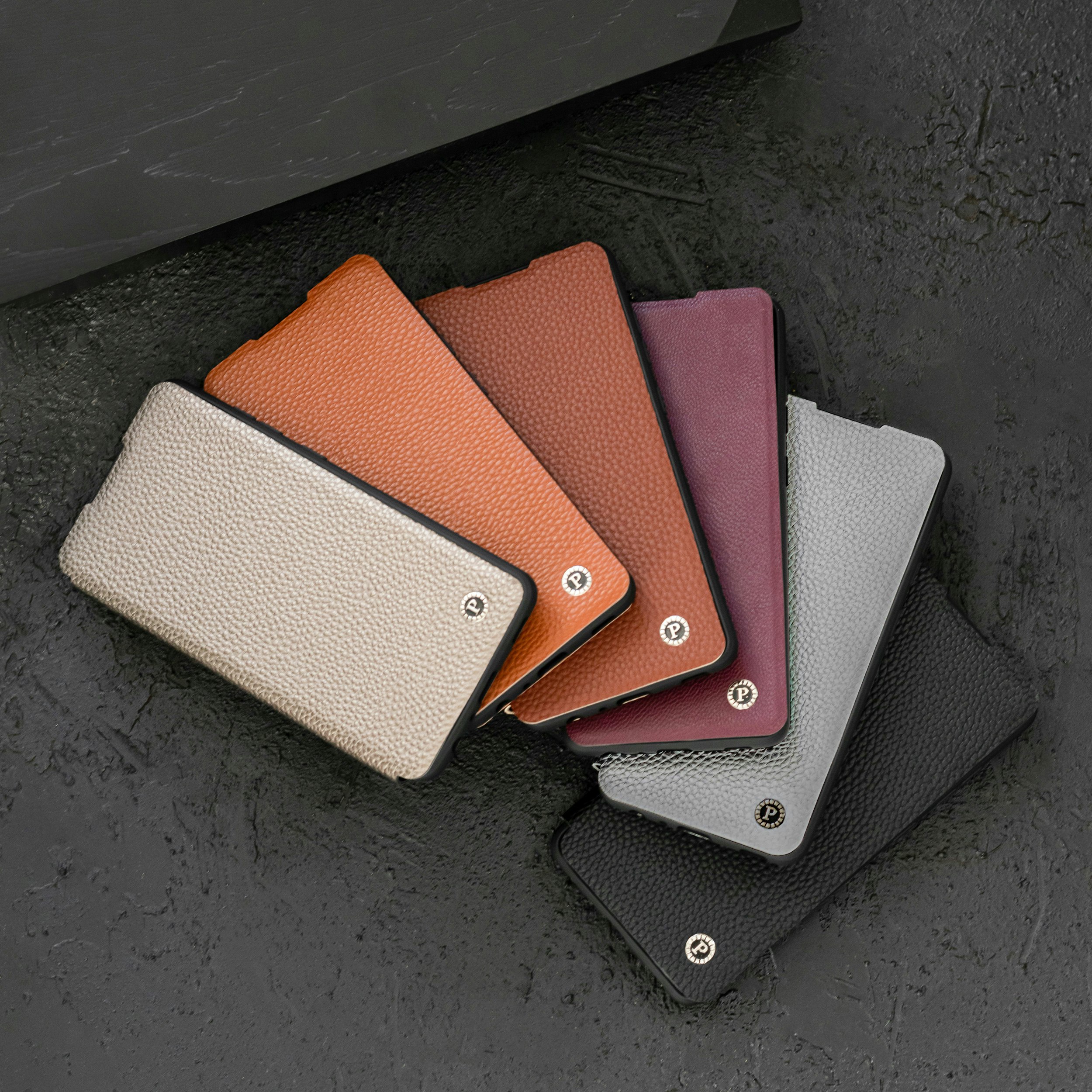 white and brown leather flip case