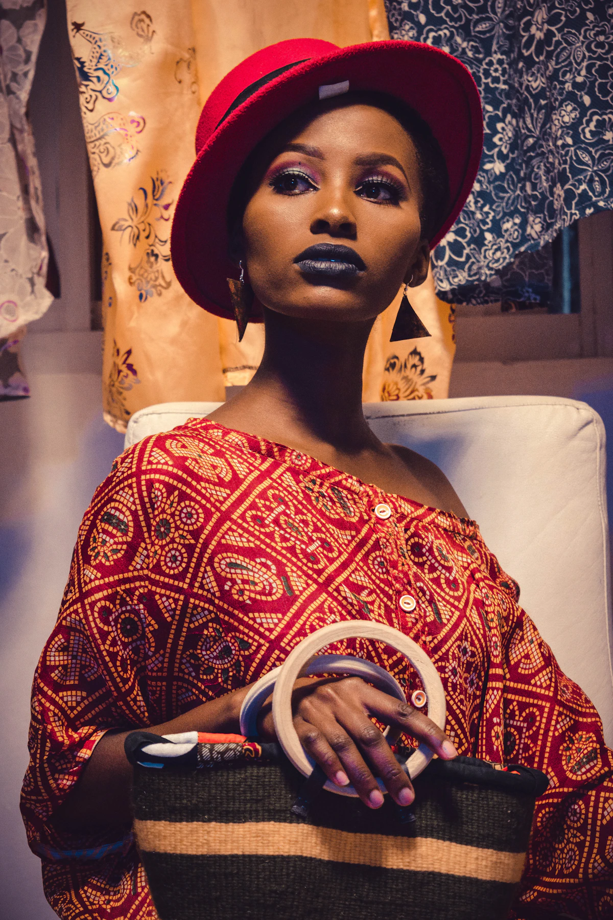 Stylish African American woman in fashionable clothing expressing confidence