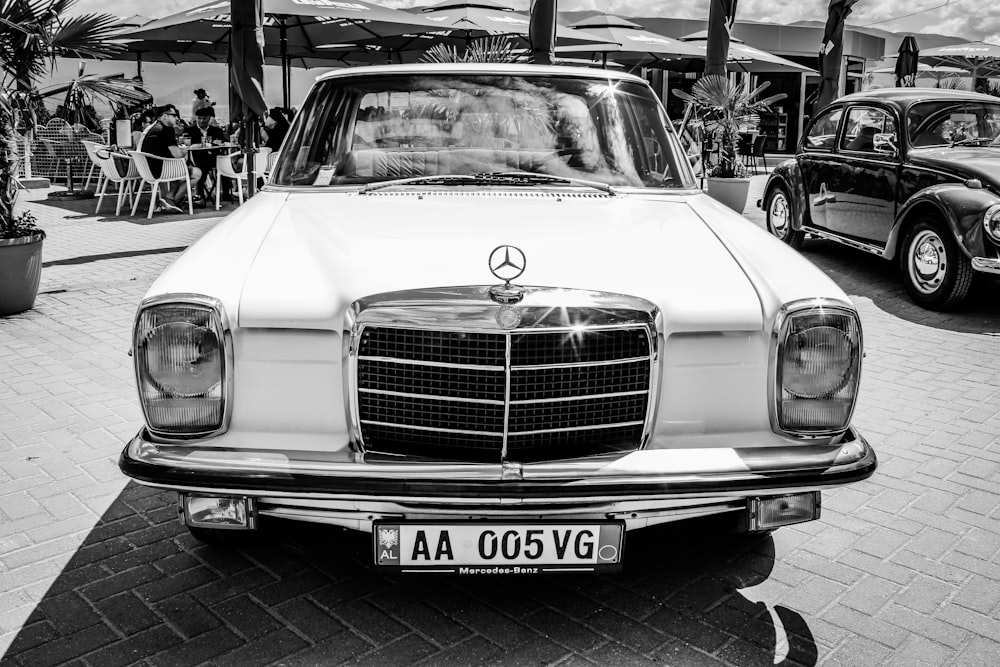 grayscale photo of classic car