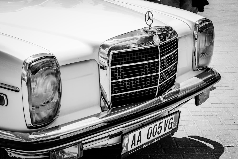 grayscale photo of classic car