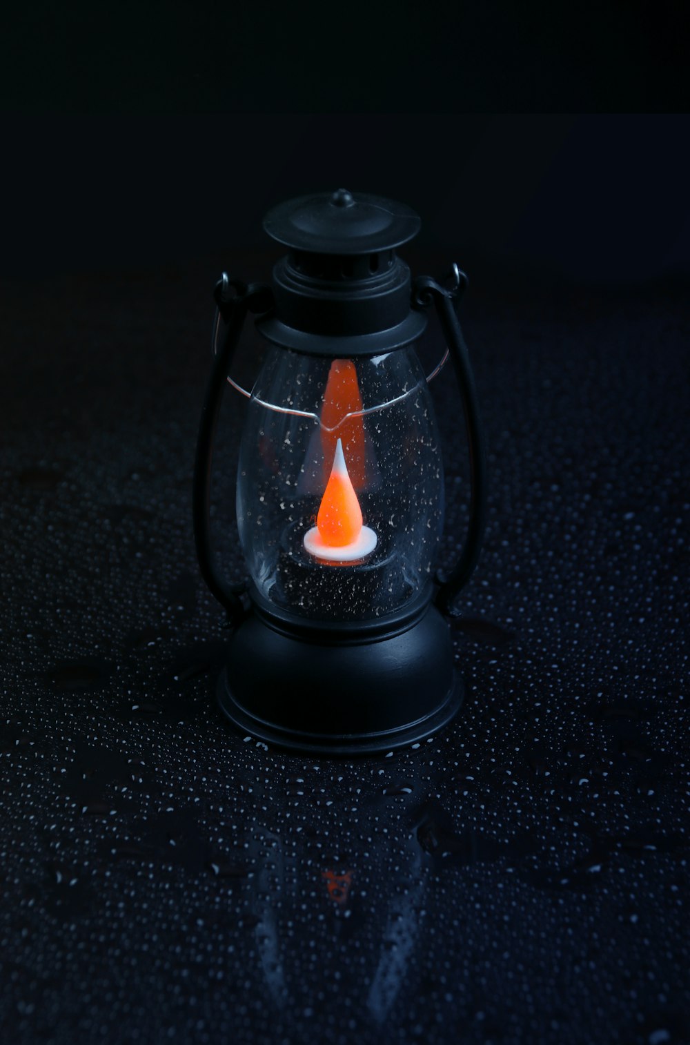 black lantern on black table