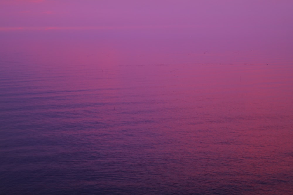 purple and blue sky over the sea
