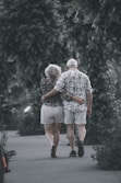 man and woman walking on the street during daytime