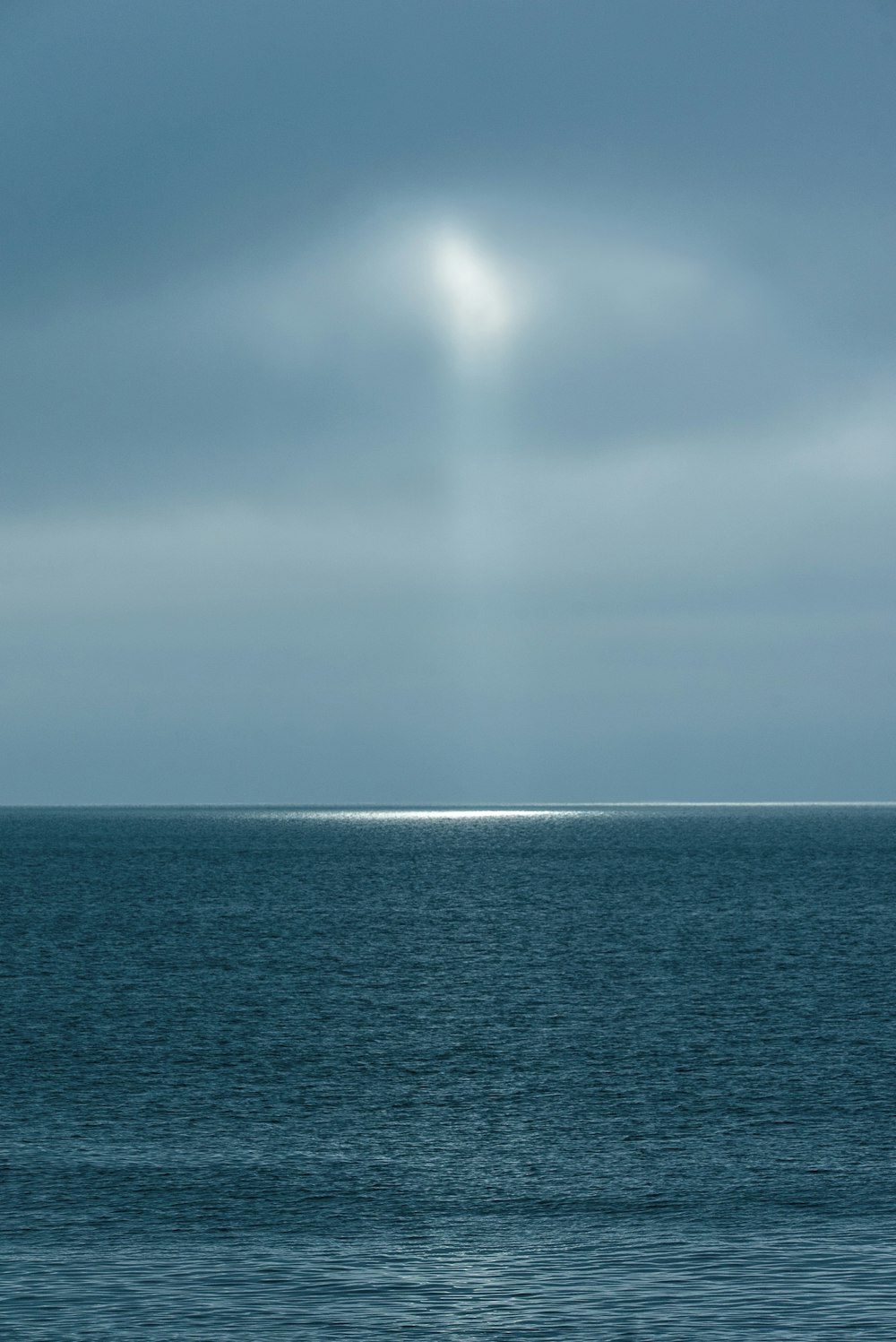 blue sea under blue sky during daytime