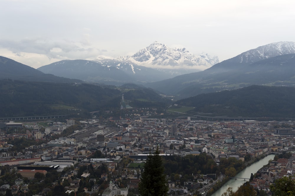 aerial view of city near mountain during daytime