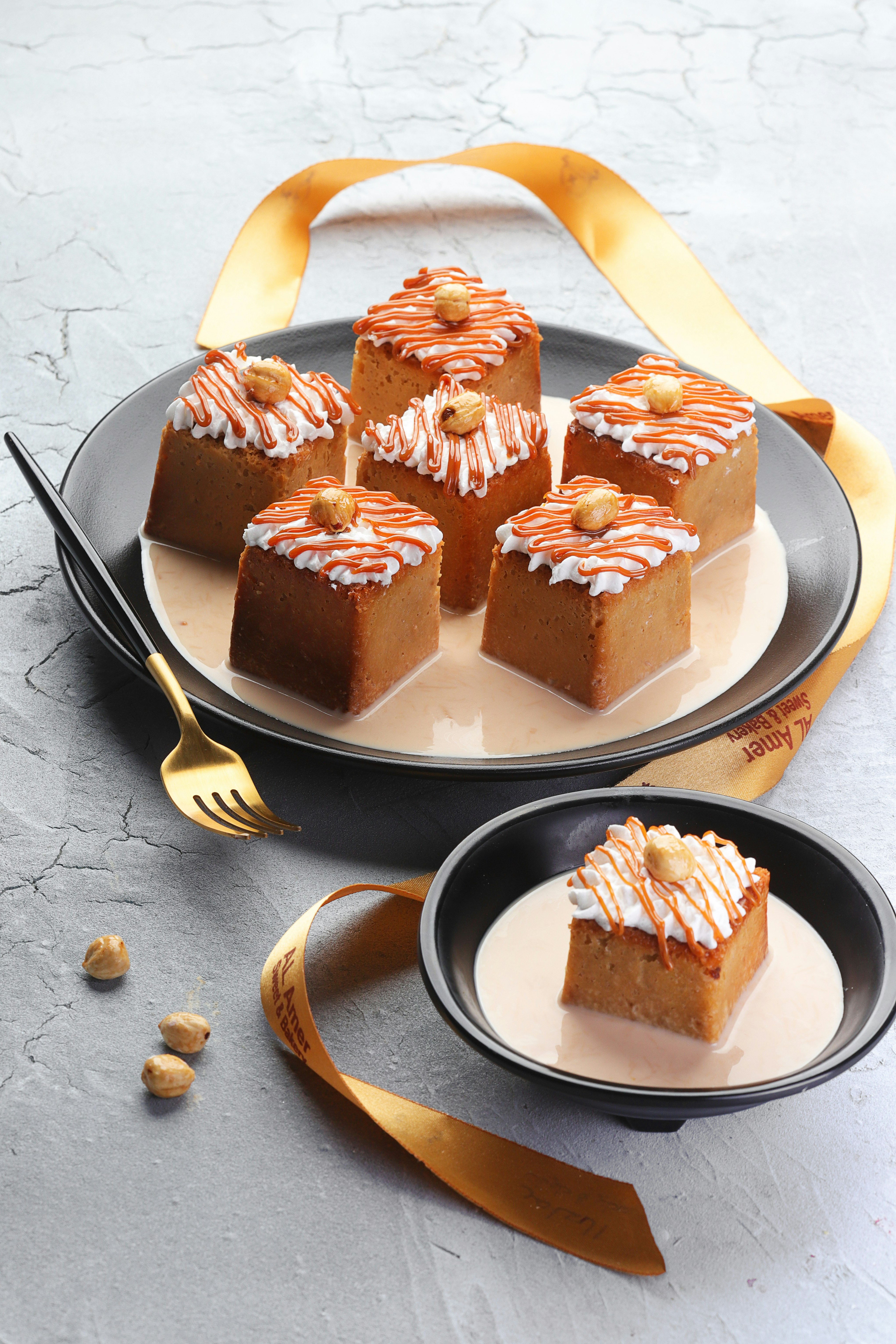 brown and white cake on white ceramic plate