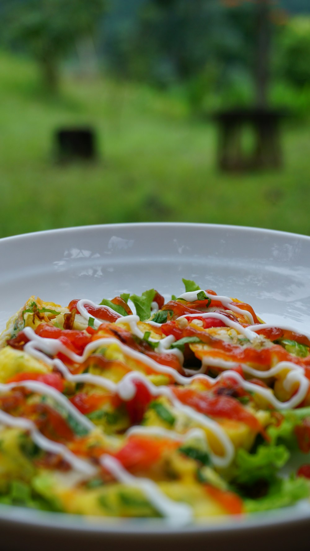 vegetable salad on white ceramic bowl