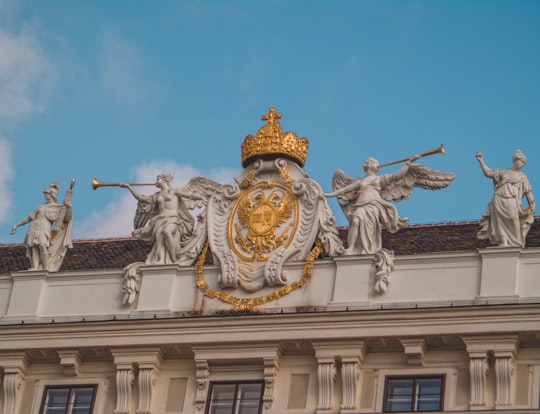 gold and white lion statue in Hofburg Imperial Palace Austria