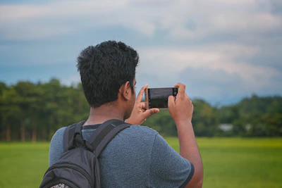 Man holding a black smartphone