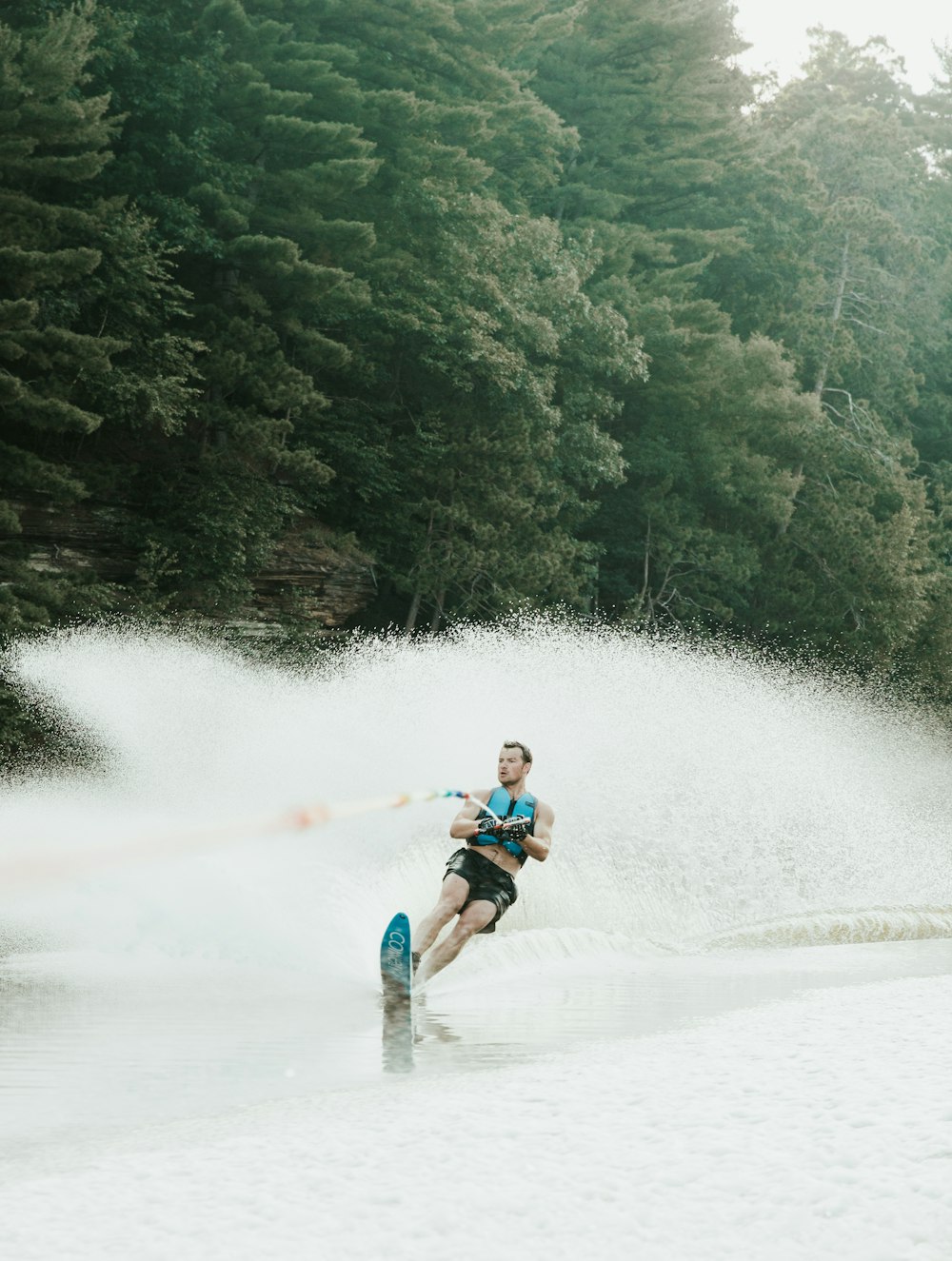 2 men surfing on water during daytime