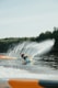 2 person riding on blue kayak on water during daytime