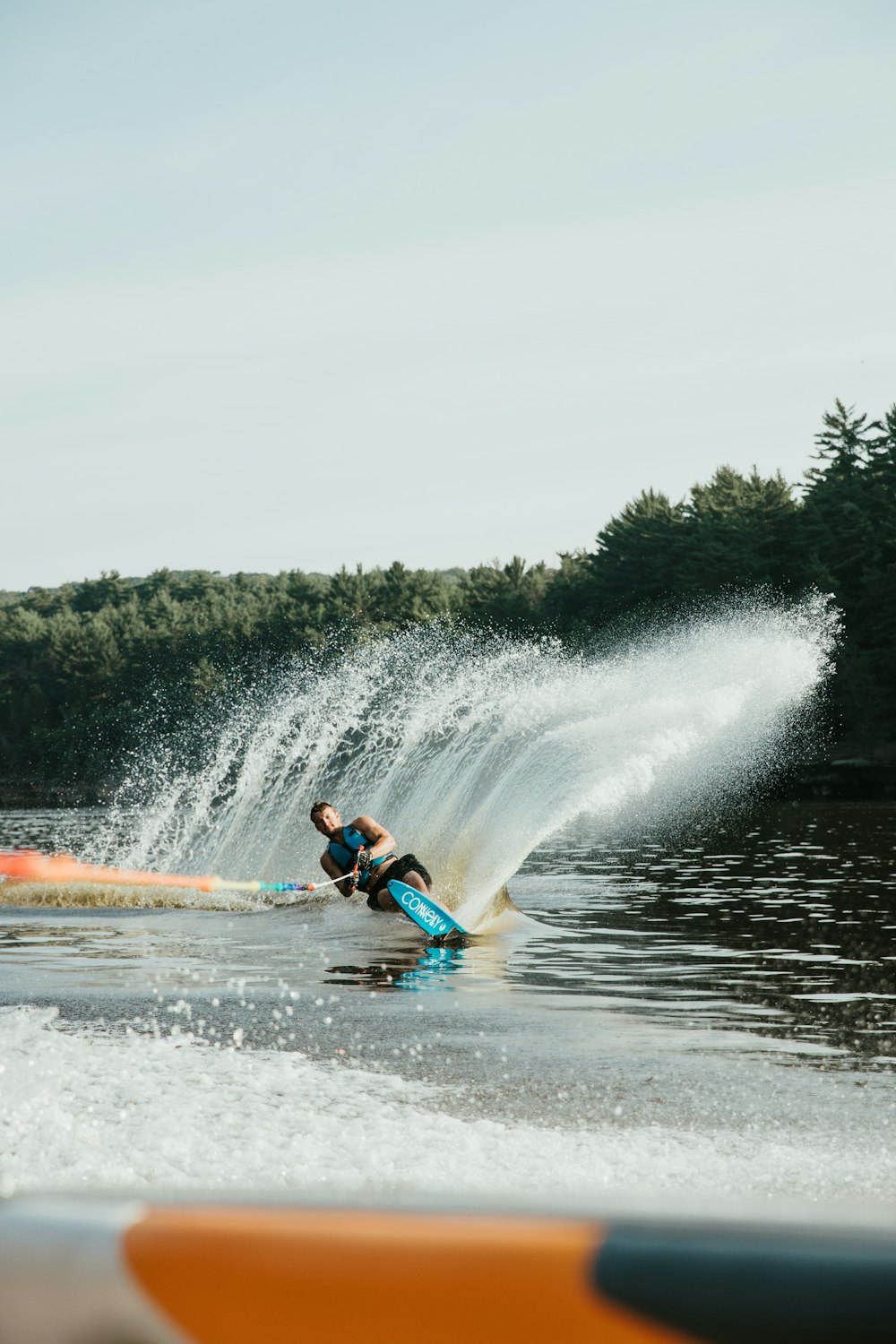 2 person riding on blue kayak on water during daytime