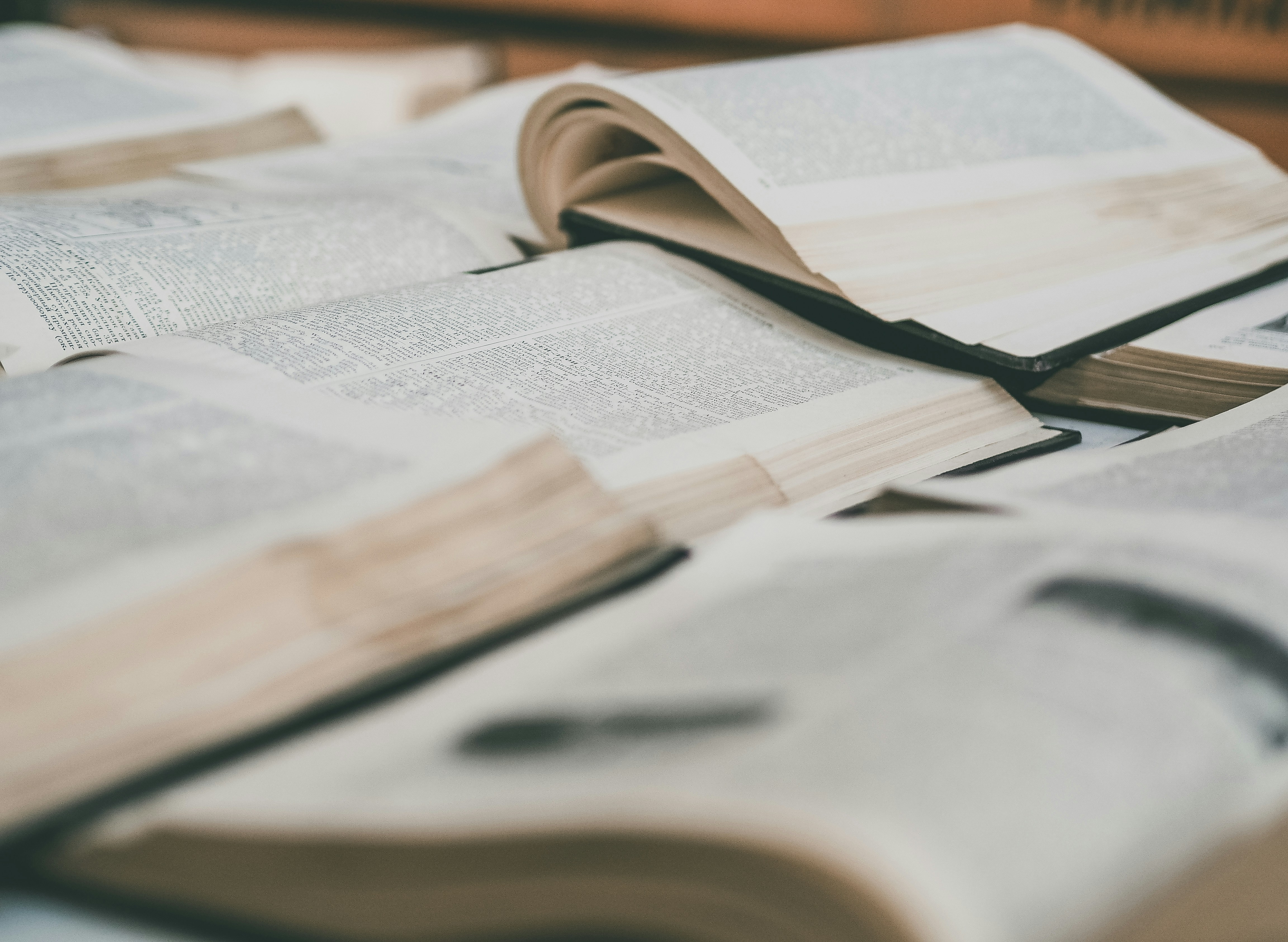 white printer paper on brown wooden table