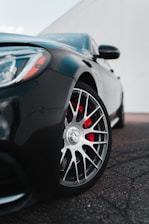 black car with chrome wheel