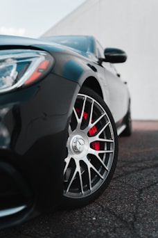 black car with chrome wheel